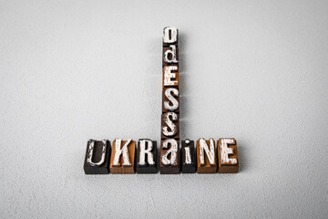 UKRAINE ODESSA. Alphabet blocks, crossword puzzle on gray textured background