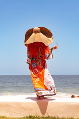 effortless flowing dress with inlaid flowers flowing in the wind