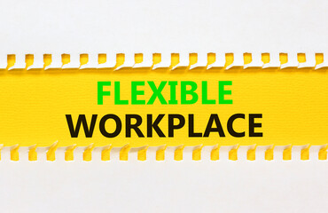 Flexible workplace symbol. Concept words Flexible workplace on beautiful yellow paper. Beautiful white paper background. Business Flexible workplace concept. Copy space.
