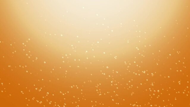 Bubbles float around the golden beer getting poured into a glass, 4K, Loop