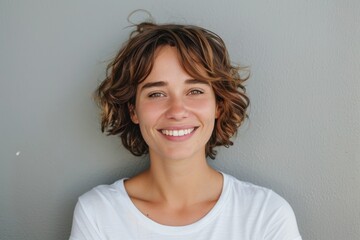 Happy Woman with Short Hair. Portrait of Attractive Young Girl Enjoying Casual Attire
