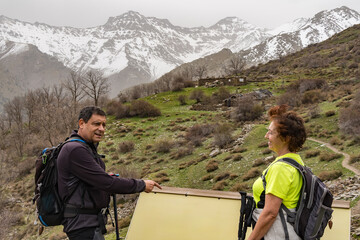 Hikers at Mirador del Hornillo with Mulhacen and Alcazaba in background