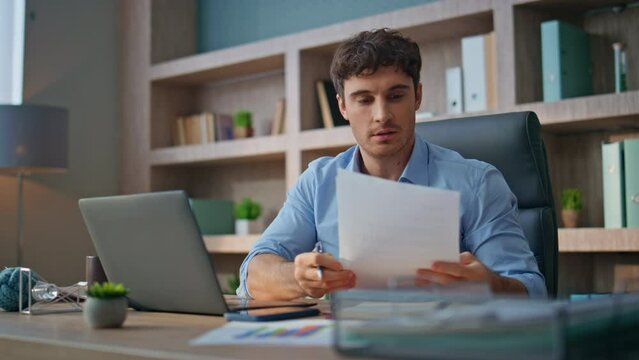 Corporate professional working computer at buro closeup. Handsome man study