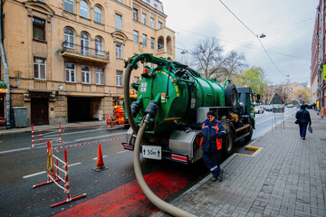 Sewage cleaning vacuum truck. Septic cleaning vacuum service and maintenance