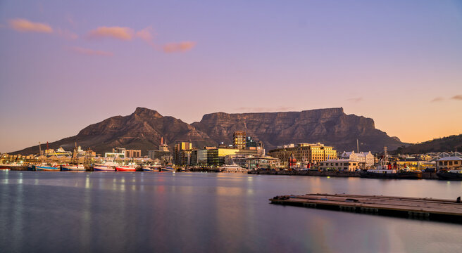 victoria & alfred v&a waterfront and table mountain in the background during sunset, Cape Town, South Africa