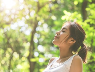 Fototapeta premium happy woman relaxing in park. Joyful female model breathing fresh air outdoors