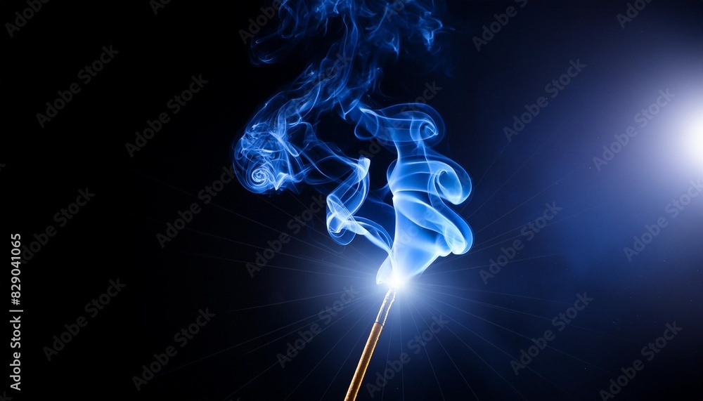 Sticker blue smoke and light shining the smoke on black abstract background