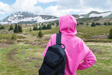 Traveler Woman standing   in the  spring mountain .Vitosha Mountain ,Bulgaria