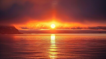 Fototapeta premium A Mesmerizing Spectacle of the Midnight Sun Unveils the Arctic's Enchanting Beauty