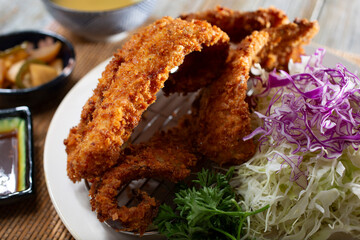 A view of a plate of squid katsu.