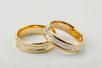 Golden wedding rings on a white background. Bride and Groom Rings
