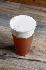 A view of a mango black tea drink.