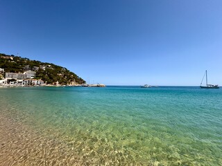 beautiful bay with small marina for yachts in the village Llafranc, Camí de Ronda, Costa Brava, Girona, Catalonia, Spain