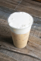 A view of a frothy milk tea beverage.