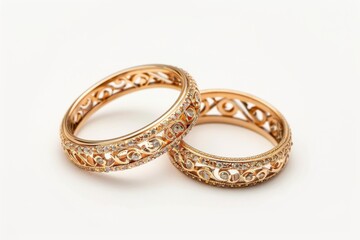 Golden wedding rings on a white background. Bride and Groom Rings