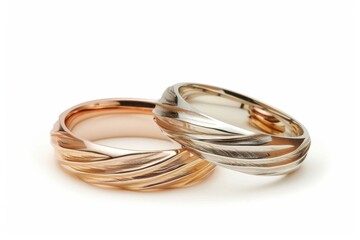 Fototapeta premium Golden wedding rings on a white background. Bride and Groom Rings