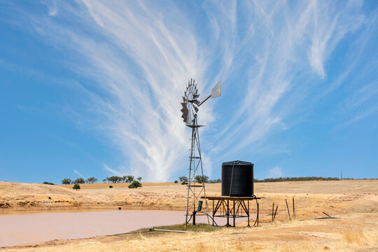 Old metal windmill in rural outback landscape, Western Australia, Australia