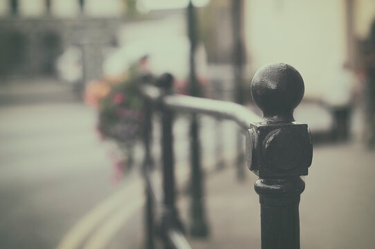 Close-up of metal railings with flower planters in the street, Cashel, County Tipperary, Ireland