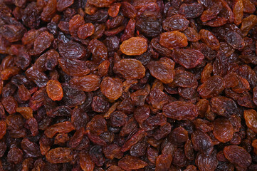 a lot of dark raisins background