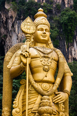 42m tall golden Murugan statue at the entrace to the Batu Caves in Kuala Lumpur