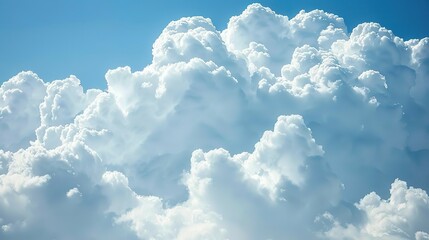 Naklejka premium Large white clouds against a blue sky background. A Majestic Display of White Clouds