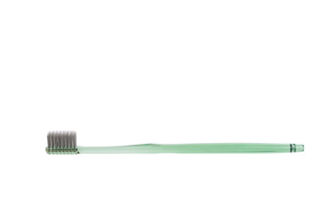 Green toothbrush on white background