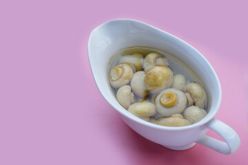 Champignon mushrooms in brine. Canned champignon mushrooms whole