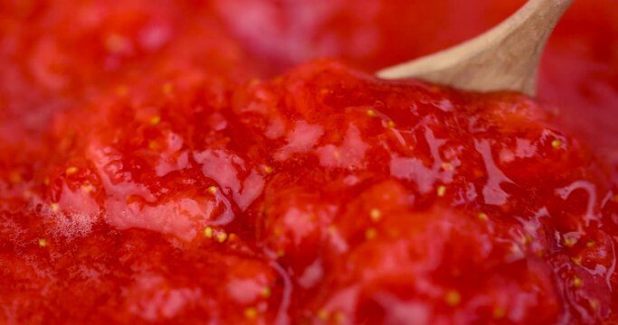 strawberry puree of fresh red strawberries, homemade organic strawberries while cooking berry puree and jam