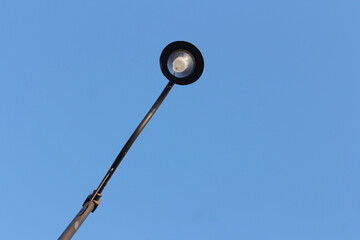 Street lights on blue sky background