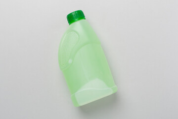 Can with antifreeze on color background, top view