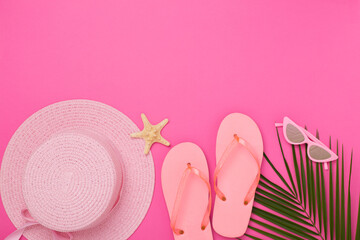 Flat lay with pink summer outfit on color background. Vacation concept