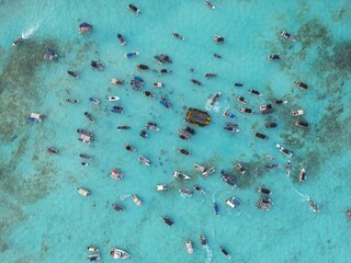 Heavily boat crowded marine area in San Andres Island. This spot is known as white water due to the tourquoise color of the water given from the sandy seabottom
