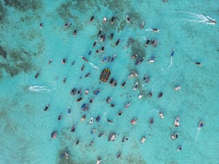 Heavily boat crowded marine area in San Andres Island. This spot is known as white water due to the tourquoise color of the water given from the sandy seabottom