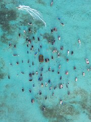 Heavily boat crowded marine area in San Andres Island. This spot is known as white water due to the tourquoise color of the water given from the sandy seabottom
