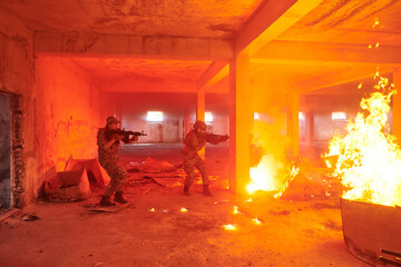  A group of professional soldiers bravely executes a dangerous rescue mission, surrounded by fire...