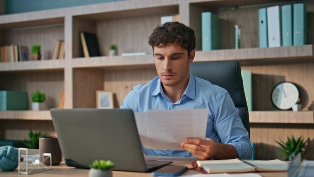 Busy ceo working office checking documents closeup. Serious man doing research