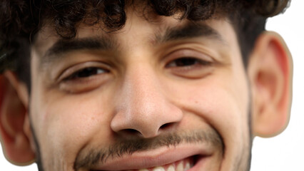 Man's face, on a white background, close-up