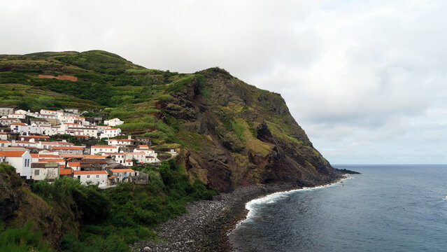 Corvo Island, Azores, Portugal. View of resident houses in the island's mountains close to the shoreline               