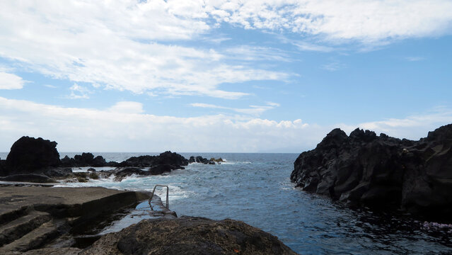 Corvo Island, Azores, Portugal. Volcanic rocky natural swimming pool.