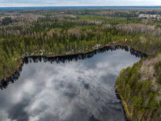 Top view of beautiful forest areas with a lake. Russia, Karelia.