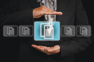 Document management concept, Businesswoman hands holding Document management icon on virtual screen, Document Management System and process automation to efficiently document paperless operate.