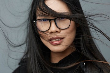 Woman portrait asian fashion studio background glasses beautiful smile