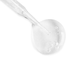 Glass pipette and transparent liquid isolated on white, top view