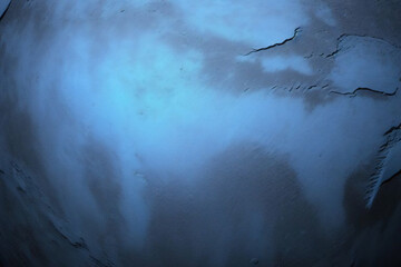 Dark Blue background with grunge backdrop texture, watercolor painted mottled blue background, colorful bright ink and watercolor textures on black paper background.