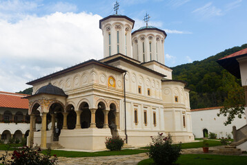 Monastery Horezu is architectural landmark outdoors.