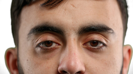 Man's eyes, close-up, on a white background