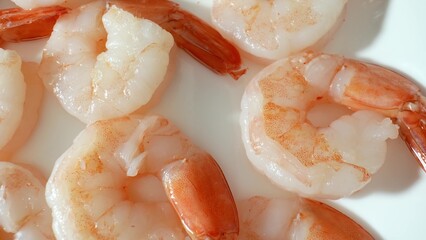 Cooked shrimp: delightful taste, texture, and nutrition. Popular in diverse culinary creations worldwide, loved by seafood enthusiasts. Shot with 24mm probe macro lens. Shrimp background.
