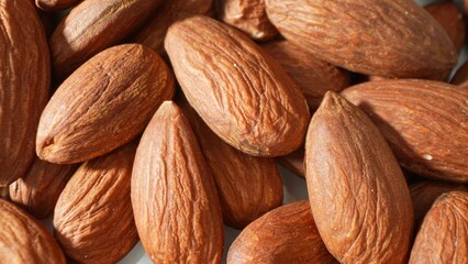 With their rich, brown hues and a subtle sheen, these toasted almonds exude warmth and flavor. Perfectly roasted, they're a delectable snack or a savory addition to any culinary creation.
