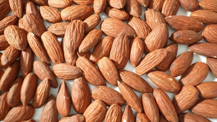 Experience the essence of nature in a stunning portrayal of raw almonds. Each intricate detail...
