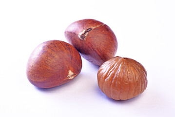 Delicious roasted  chestnus  on white background.  